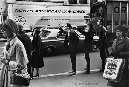 Daniel Kramer, Bob Dylan, Peter Yarrow, and John Hammond Jr. Hailing Cab, New York, 1965