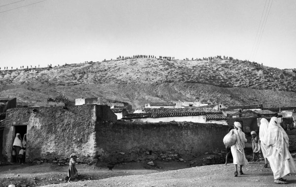 Phil Stern, Rangers on a Mountaintop Overlooking a Tunisian Village, 1943