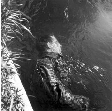 Lee Miller&nbsp;, Dead SS Guard,&nbsp; Floating in Canal, Dachau, 1945&nbsp;