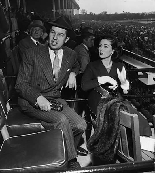 Slim Aarons, Alfred G. Vanderbilt Jr. and his wife Jean Murray Vanderbilt at Belmont Park, New York, circa 1952