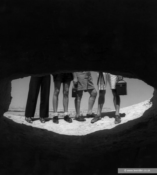 Lee Miller, Legs of Mafy Miller, George Hoyningen-Heun&eacute;, and Roland Penrose, Siwa, Egypt, 1939