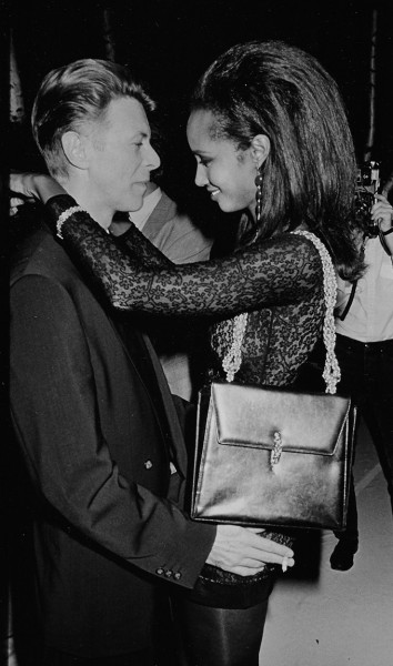 Ron Galella, David Bowie and Iman at &quot;7th On Sale&quot;, a gala fundraising benefit for AIDS at the 69th Regiment Armory, New York, 1990