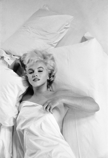 Eve Arnold, Marilyn Monroe resting between takes during a photographic studio session in Hollywood, for the making of the film &quot;The Misfits&quot;, 1960