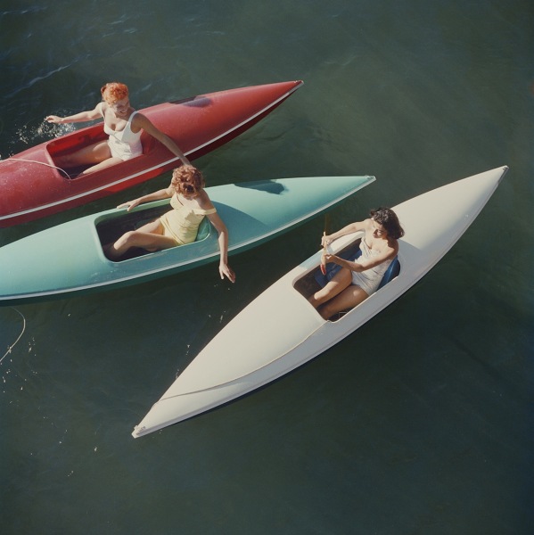 Slim Aarons, Lake Tahoe Trip: Young women canoeing at Zephyr Cove on the Nevada side of Lake Tahoe, USA, 1959