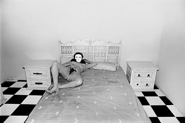 Woman on bed by Scot Sothern