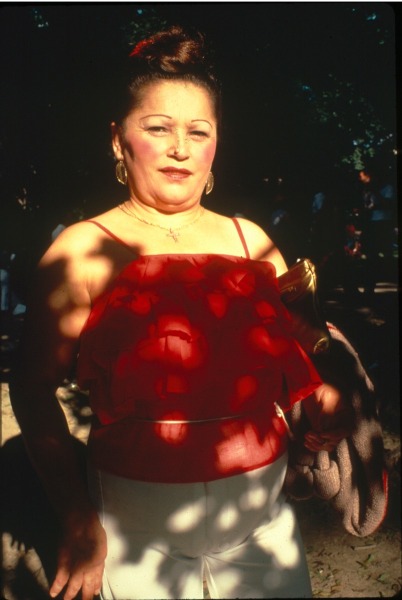 Woman in red blouse by Arlene Gottfried