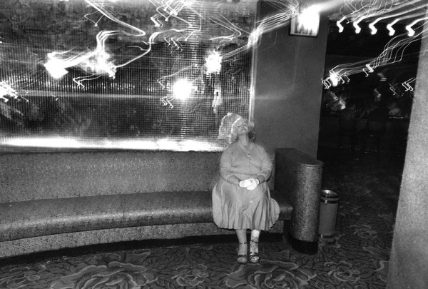 Woman at disco by Len Speier