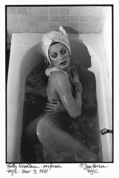 Holly Woodlawn in bathtub by Don Herron