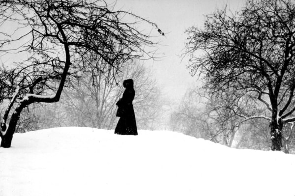 Woman in snow by Len Speier