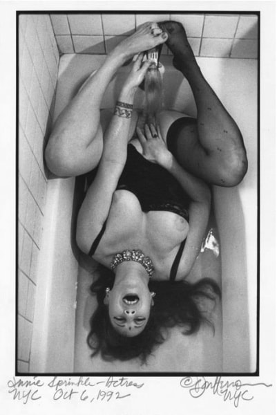 Annie Sprinkle in bathtub by Don Herron