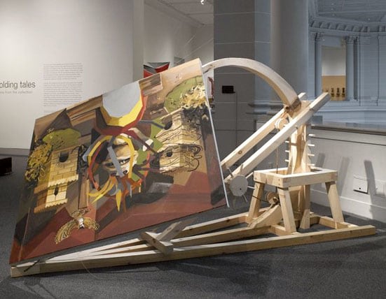 Caitlin Cherry,&nbsp;Dual-Firing Trebuchet Artcraft &quot;Virgin On The Rocks,&quot;&nbsp;2013, Oil on canvas with wood and rope construction, 108 x 108 x 48 inches, dimensions variable with installation.&nbsp;Photo by the Brooklyn Museum.