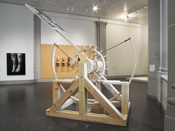 Caitlin Cherry,&nbsp;Dual-Capable Catapult Artcraft &quot;Your Last Supper Sucker,&quot;&nbsp;2013, Oil on canvas with wood and rope construction, 72 x 96 x 120 inches, dimensions variable with installation.&nbsp;Photo by the Brooklyn Museum.