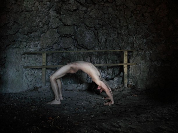 Man in yoga pose by Shen Wei