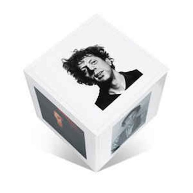 Cube of portraits of Philip Glass, featuring images by Chuck Close and Robert Mapplethorpe.