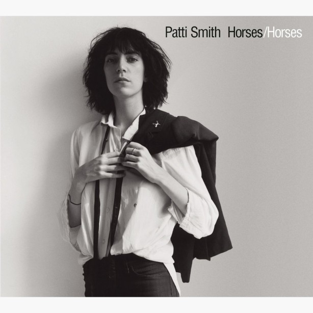 Patti Smith Horses album cover (Patti leaning against wall with jacket slung over her shoulder, looking directly at camera).