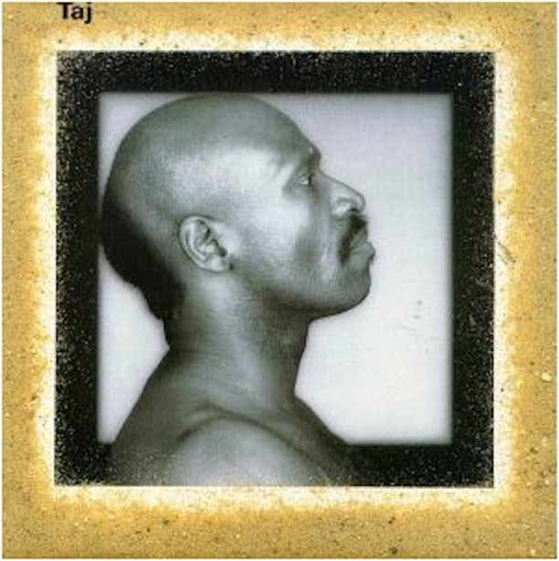 Album cover for Taj Majal Taj, portrait of Taj Mahal in profile agains a white square, with a gold frame around the album's edge.