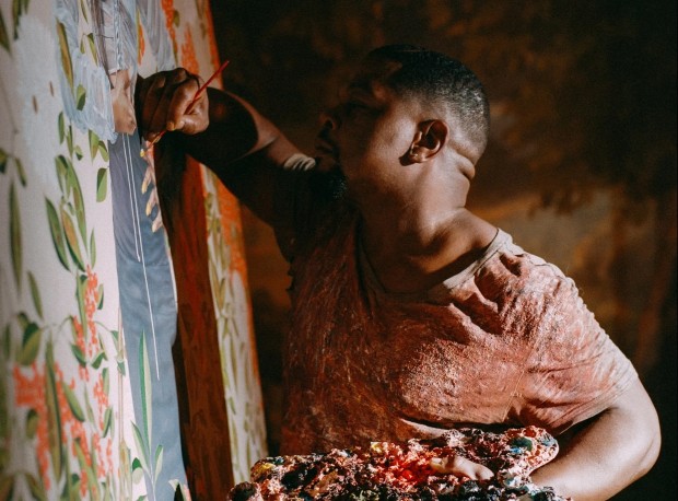 Kehinde Wiley painting in studio, Photograph by Shikeith for The New Yorker