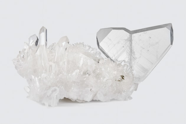 Fine mineral photograph of japan-law twin quartz on white from wilensky exquisite minerals habits exhibition.