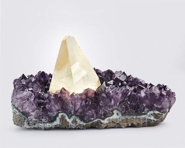 Calcite on amethyst on white background