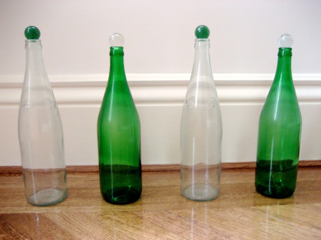 Tony Feher Prologue, Act 1, Act 2, Epilogue (Michael Hurson), 1995 Four glass bottles with marbles Two clear bottles: 13 3/4 inches tall (34.9 cm) Two green bottles: 13 1/4 inches tall (33.7 cm)