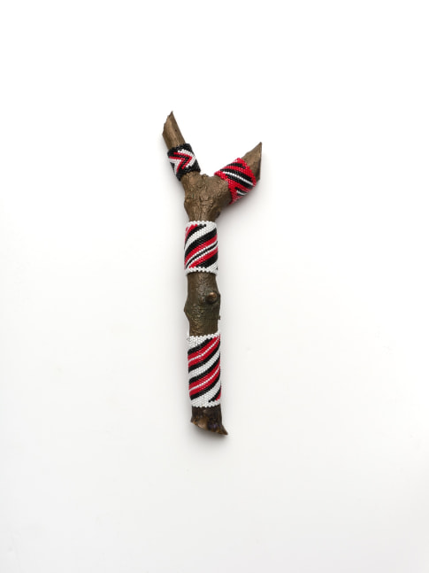 Saif Azzuz To be present, 2022 Glass beads on bronze 8 1/2 x 2 3/4 x 1 1/2 inches 21.6 x 7 x 3.8 cm