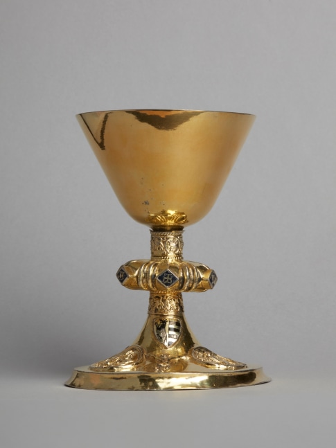 A chalice showing the four Evangelists and the arms of the von Sundhausen, c. 1330-1350
Germany, Thuringia, Nordhausen?
Gilded silver with basse-taille enamels
The calyx replaced 5 3/4 (height) x 4 3/8 (diameter at foot) inches
(14.5 x 11.1 cm)
Weight 307 grams