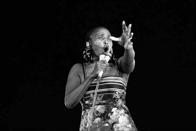 Bob Crawford (1939-2015)
Untitled (Miriam Makeba at FESTAC 1977), 1977
Archival inkjet print on Simply Elegant Gold Fibre paper
Image: 13 1/4 x 20 inches (33.7 x 50.8 cm)
Sheet: 17 x 22 inches (43.2 x 55.9 cm)
Framed: 18 5/8 &amp;times; 25 3/8 &amp;times; 1 1/2 inches (47.3 &amp;times; 64.5 &amp;times; 3.8 cm)
Edition of 3, printed 2023