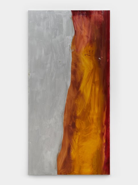 A large vertically rectangular abstract painting in silver on the left half and a rusted ochre on the right side.