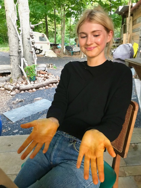 Hands, neck and face all tinted orange!