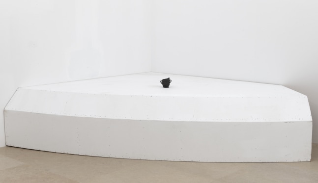 Gedi Sibony
Primary Element, 2019
Black clay, painted wooden plinth
Vessel: 3 1/4 x 3 1/4 x 2 3/4 inches (8.3 x 8.3 x 7 cm)
Plinth: 18 1/8 x 82 x 69 inches (46 x 208.3 x 175.3 cm)