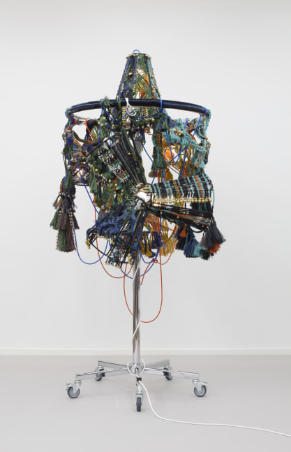 ceremonial fanfare in dual tones, 2015

clothing rack, jute twine, knitting yarn, lampshade frames, brass plated bells, nickel plated bells, metal rings, light bulbs, cord, cable, cable ties, casters

81.89 x 39.76 x 44.09 in.