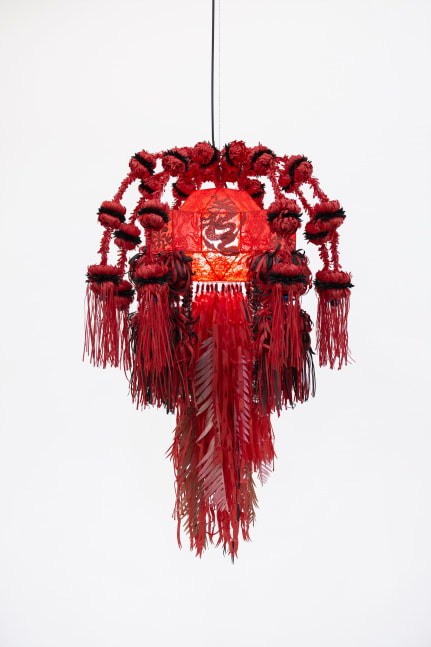 mesmerizing lantern &amp;ndash; four guardians in crimson mesh, 2022, powder-coated stainless steel frame, steel wire rope, led bulb, cable, hanji, black brass-plated bells, powder-coated stainless steel and pvd-coated stainless steel bells, stainless steel bells, split rings, plastic raffia string, jute twine, 140 x 90 x 90 cm

photo: Studio Haegue Yang