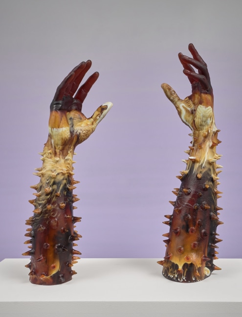 a self that is not quite here but always in process, 2022. cast lead crystal glass. 17 1/2 x 5 1/2 inches (left arm), 16 x 5 inches (right arm)