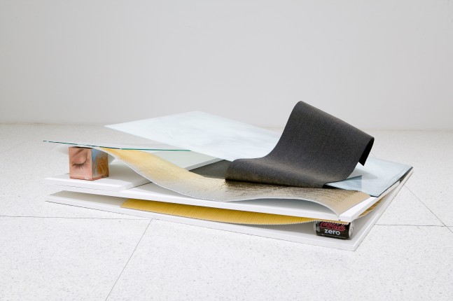 overlapping statistics (blind olives eyelid), brussels, 2007
painted plywood, weather proof roofing roll, painted glass, tissue box, painted jar, insulation roll
9.45 x 48.03 x 48.03 in.

&amp;nbsp;

&amp;nbsp;