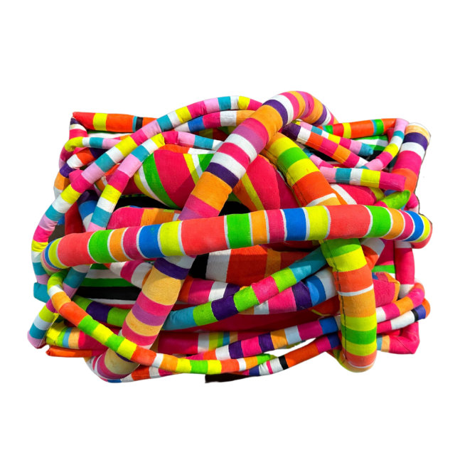 ensoñación, 2023. mixed media: mattress fabric, foam rubber and fluorescent paint, 45 x 35 x 20 cm.