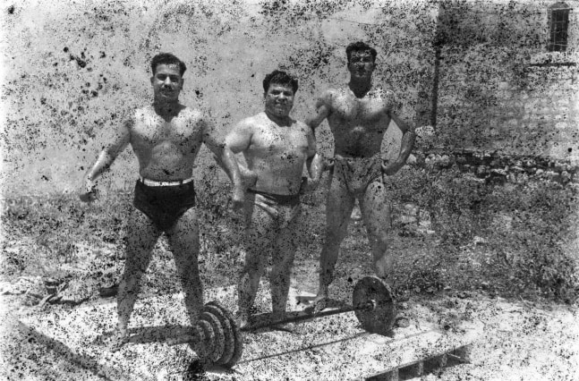 bodybuilders, 2011
printed from a damaged negative showing from left to right: hassan al aakkad, munir el dada, and mahmoud el dimassy in saida, 1948
digital print
70.9 x 57.1 in.

&amp;nbsp;

&amp;nbsp;

&amp;nbsp;