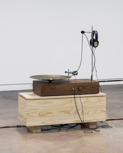 the whisperers: platinum record player, 2021-2022

piano string, cymbal, sound proof wooden box, mixer, amplifier, transducer, stands, clamps, motor, stone polishing tool, headphones 130 x 51 x 102 cm