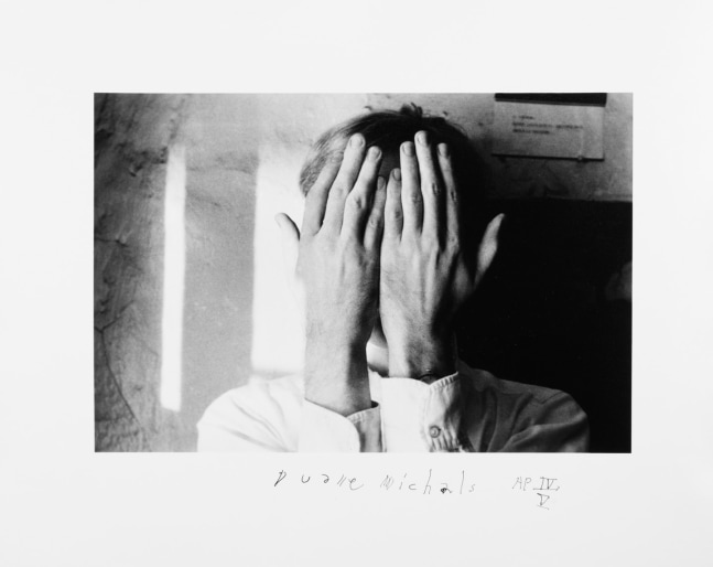 Andy Warhol (Covering Face), c. 1958, Gelatin silver print 6 5/8 x 10 inches (image); 11 x 14 inches (paper) AP IV/V