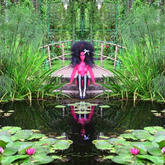 A photo of artist and rocker Kebra Pfahler in Monet&amp;#39;s Giverny Garden, part of a new exhibit at The Hole.