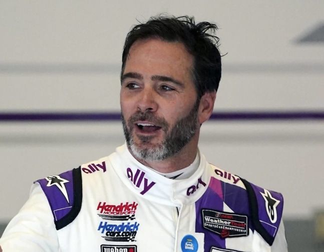 Jimmie Johnson decided it might be cool to turn his 2006 Daytona 500 racing suit into an art installation following a dinner in New York several years ago. John Raoux AP 2021 FILE PHOTO