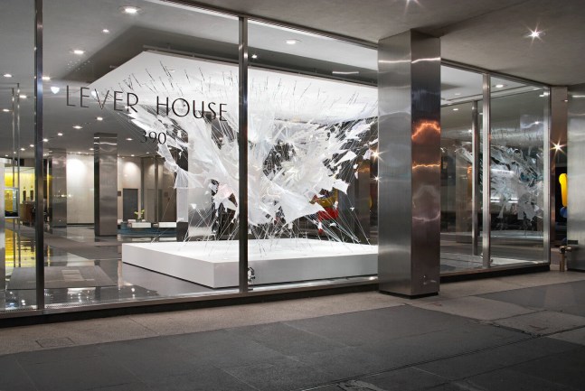 View of "Bride Fight" from outside of the Lever House lobby. 