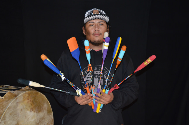 Mr. Yahola displaying a variety of his drumsticks.

&amp;copy;2021 IACB