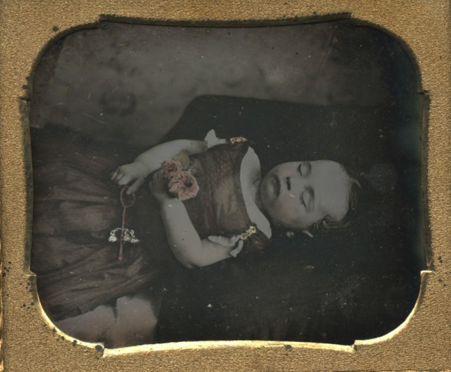 UNKNOWN AMERICAN PHOTOGRAPHER Postmortem, girl with pink flowers, 1850s Hand tinted sixth plate daguerreotype