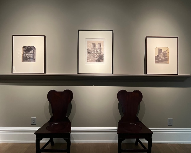 Fifth and final installation view, 2 prints of churches, interior and exterior, by Lucy Fleming, 1 Bisson Brothers lithograph of Notre Dame, exterior view