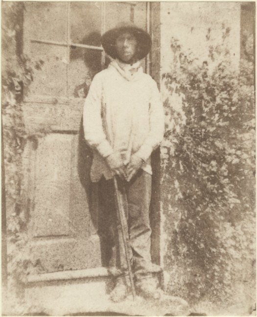Rev. Calvert Richard JONES (Welsh, 1802-1877) Manservant standing in doorway, circa 1850 Salt print from a calotype negative 10.9 x 8.8 cm