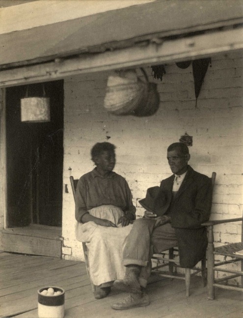 Doris ULMANN (American, 1882-1934) Seated couple on a porch, Berea, Kentucky, circa 1920s Platinum print 20.0 x 15.5 cm