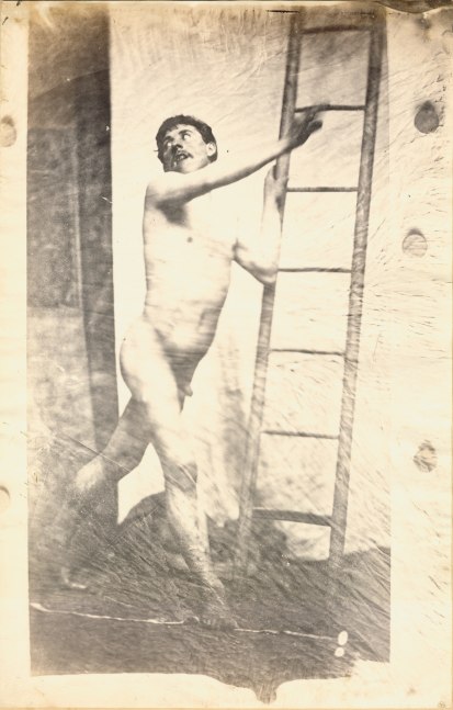 Unidentified photographer attributed to the Circle of Charles Simart Male nude, clutching ladder, Folio 3 recto, from the album assembled circa 1856-1860 Salt print from an enlarged collodion negative 43.8 x 28.2 cm