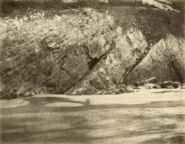 Hugh OWEN (English, 1808-1897) Sandy shore, possibly Caswell Bay, Gower Albumen print, 1860s-1870s, from a paper negative, before 1855 17.3 x 22.0 cm mounted on 26.0 x 28.3 cm album sheet Numbered &quot;45&quot; in pencil on mount