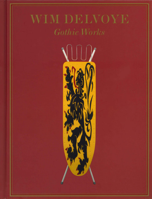 book cover with image of a Wim Delvoye yellow ironing board sculpture painted with a gothic style lion