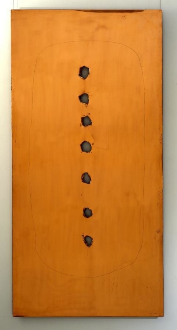 vertical copper composition with seven perforations in a vertical line